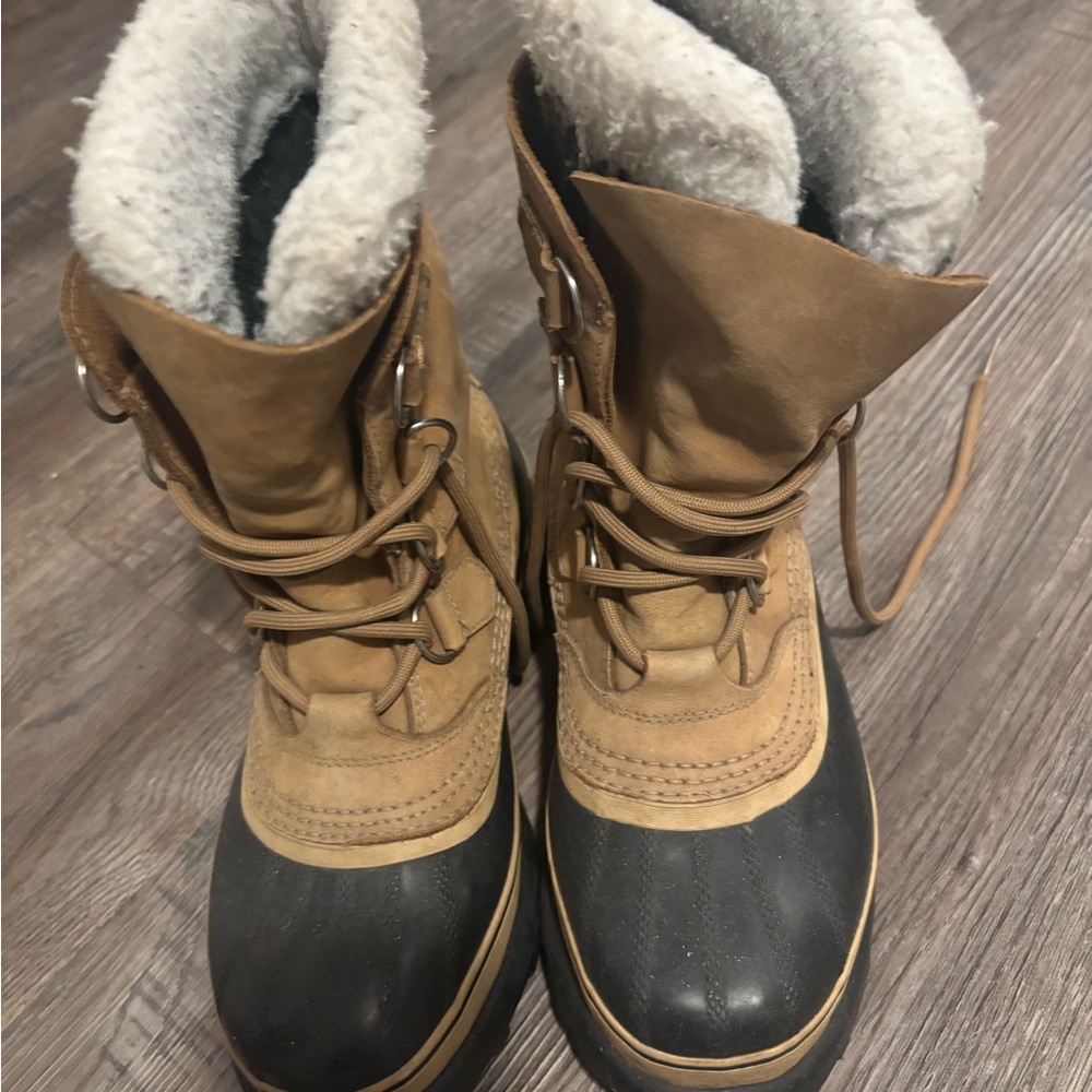 Sorel Tan and Black Winter Boots